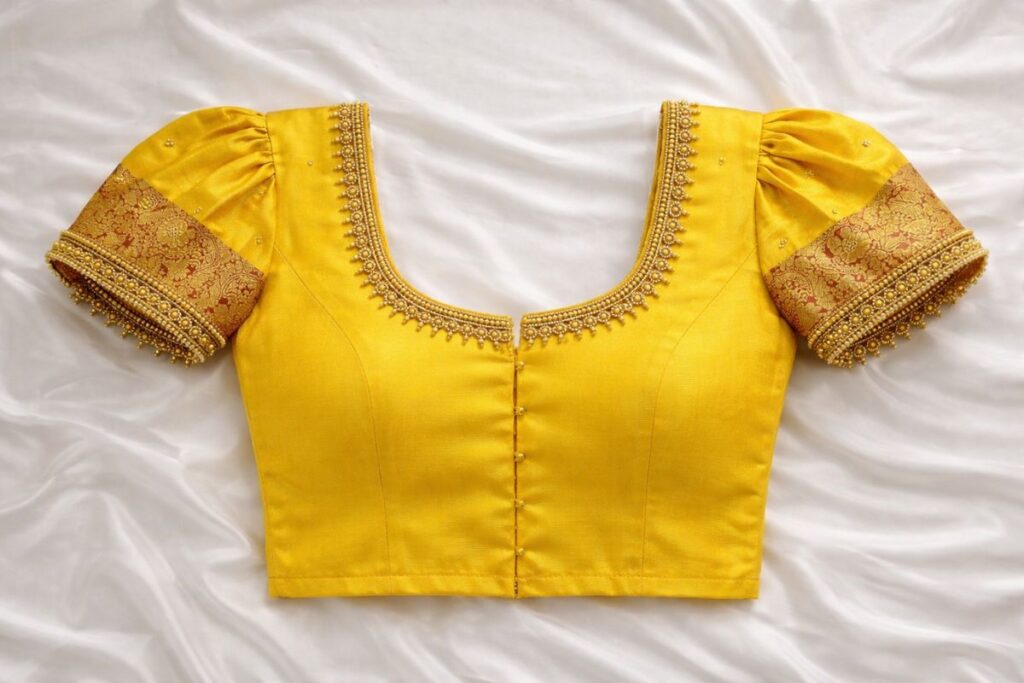 Yellow Aari Work Blouse with Puff Sleeve front neck